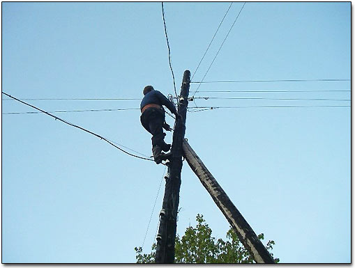 Electrician on Street Pole