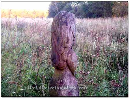 Wooden Sculpture In the Field