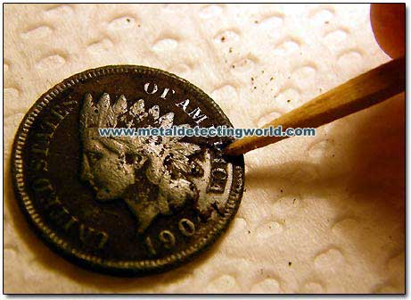 Toothpick Coin Cleaning