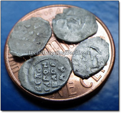 Four Tiny Silver Hammered Coins Fit on US Penny
